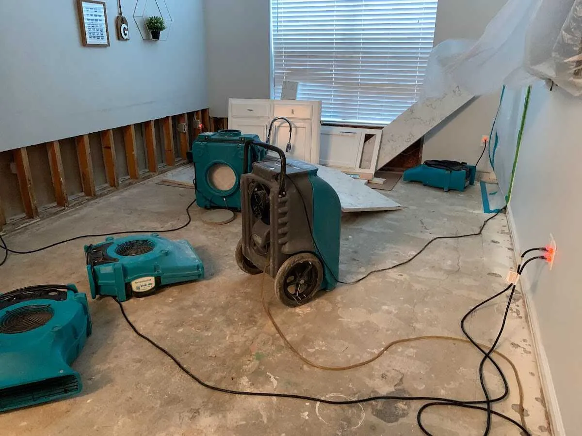 Dehumidifier in flood-cut room for Water Damage Restoration in North Salt Lake